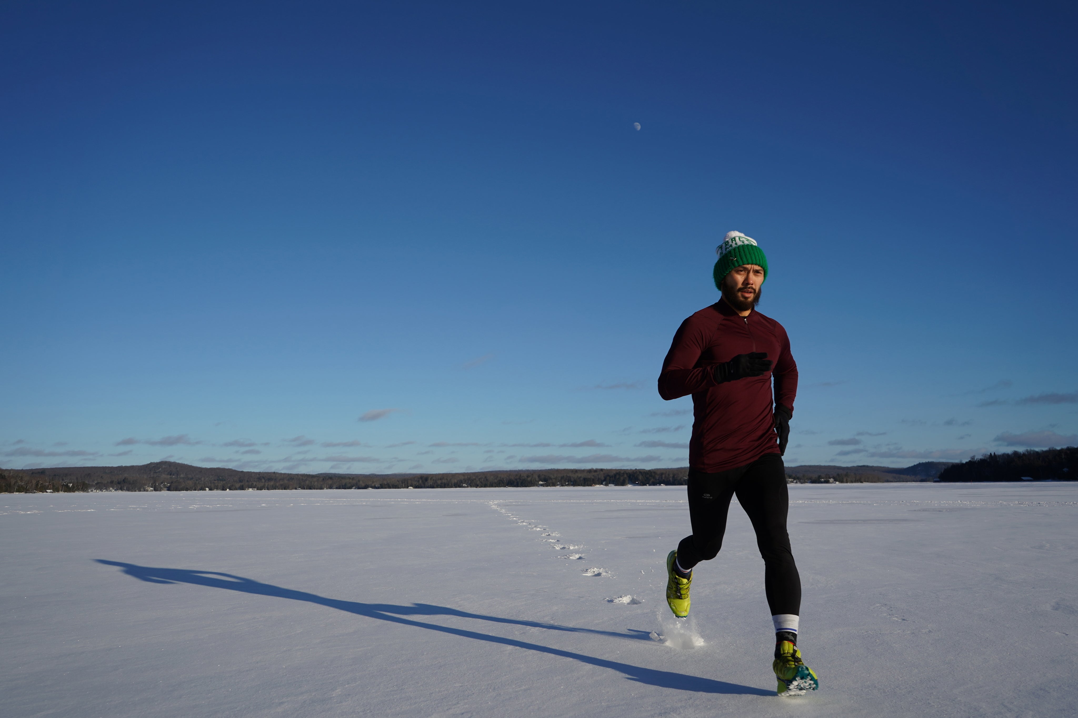 man-runs-across-snow.jpg